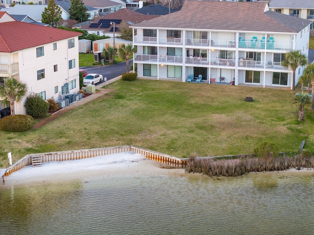 aerial view with a residential view and a water view