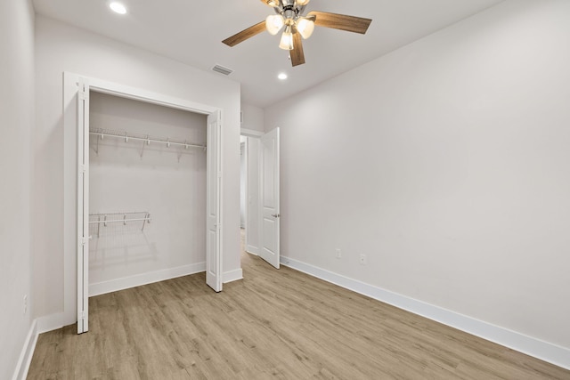 unfurnished bedroom with light wood-style flooring, baseboards, recessed lighting, a closet, and ceiling fan