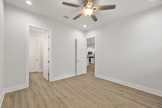 unfurnished bedroom with light wood-style floors, baseboards, recessed lighting, and ceiling fan