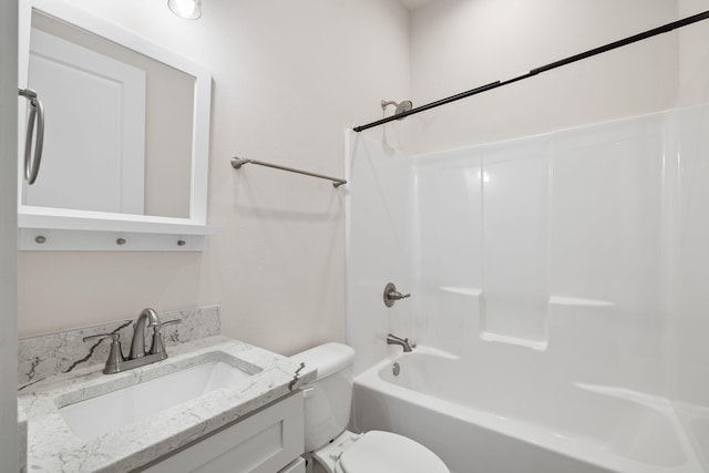 full bath featuring toilet, tub / shower combination, and vanity
