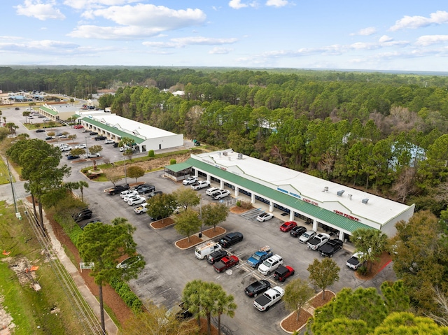 aerial view of a commercial area and a forest