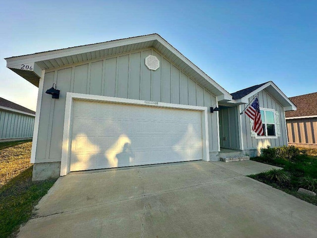 exterior space with concrete driveway