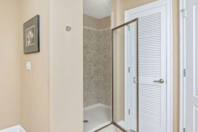 bathroom featuring a stall shower