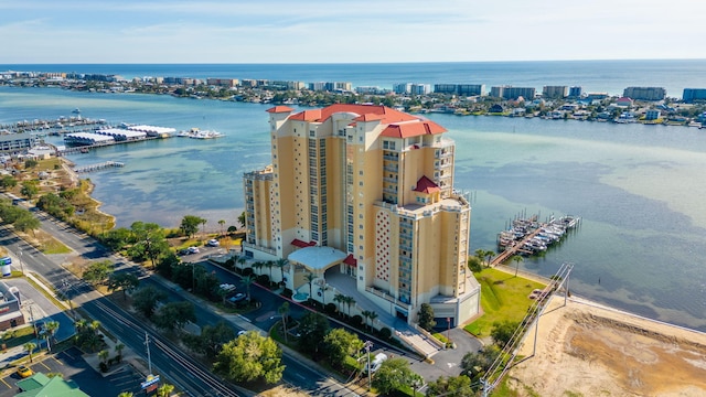 aerial view featuring a view of city and a water view