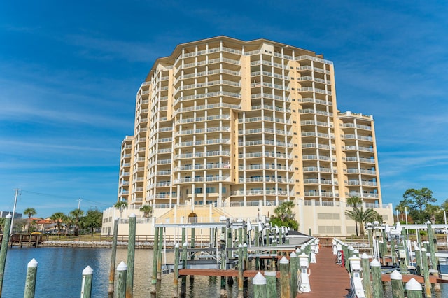 view of property featuring a water view and boat lift