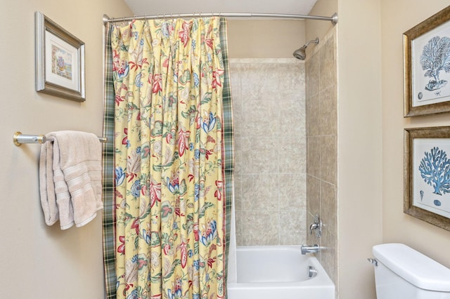 full bathroom featuring shower / bath combination with curtain and toilet