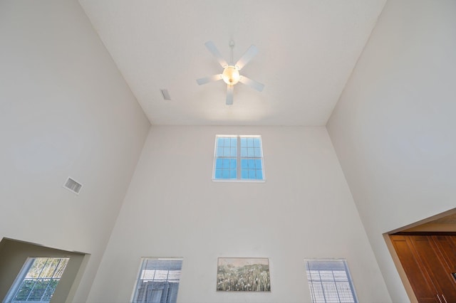 details with visible vents and a ceiling fan