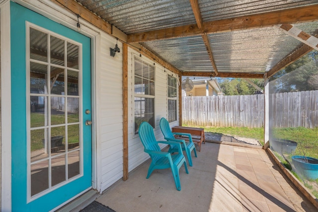 view of patio / terrace featuring fence