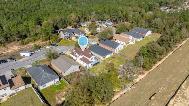 aerial view with a residential view and a forest view