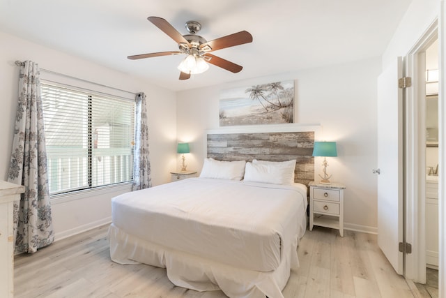 bedroom featuring light wood-type flooring, baseboards, and ceiling fan