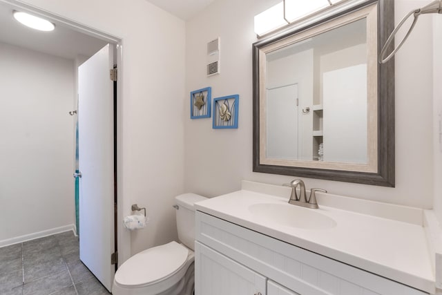 bathroom with tile patterned flooring, visible vents, toilet, and vanity