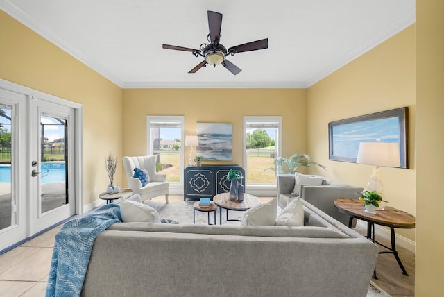 114 Golf Dr, Panama City Beach, FL 32408 - living area featuring french doors, ornamental molding, baseboards, ceiling fan, and light tile patterned flooring