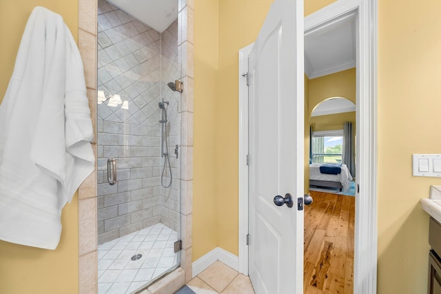 114 Golf Dr, Panama City Beach, FL 32408 - full bath with a shower stall, connected bathroom, crown molding, baseboards, and vanity