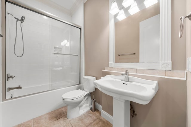 114 Golf Dr, Panama City Beach, FL 32408 - bathroom with toilet, ornamental molding, bathtub / shower combination, and tile patterned floors