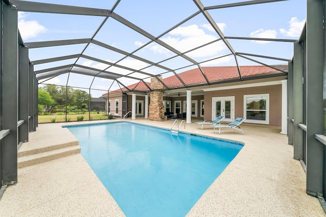 114 Golf Dr, Panama City Beach, FL 32408 - outdoor pool featuring french doors, a patio, and glass enclosure