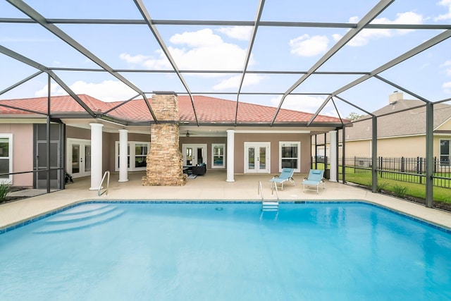 114 Golf Dr, Panama City Beach, FL 32408 - rear view of house with french doors, a patio, fence, and stucco siding