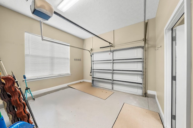 114 Golf Dr, Panama City Beach, FL 32408 - garage featuring baseboards and a garage door opener