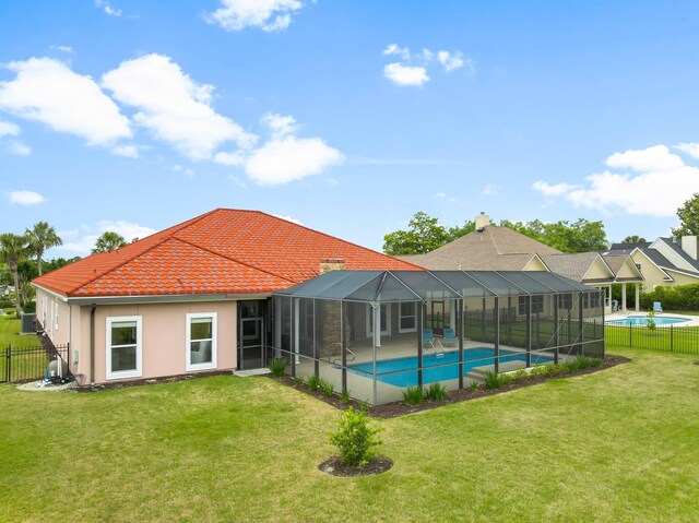 114 Golf Dr, Panama City Beach, FL 32408 - view of swimming pool featuring a lanai and a patio area