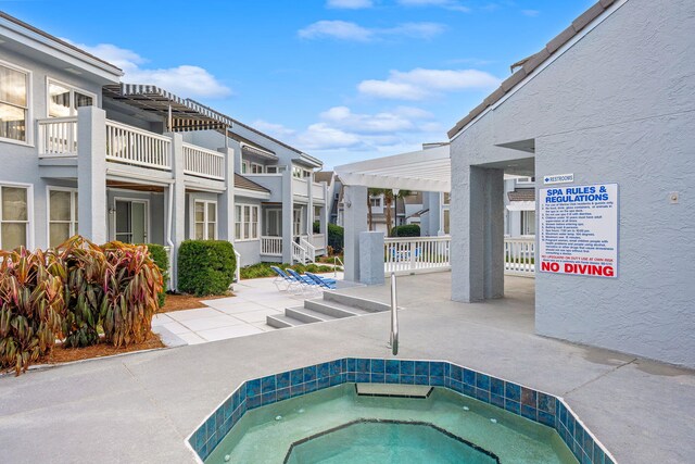 114 Golf Dr, Panama City Beach, FL 32408 - view of swimming pool featuring a residential view and a community hot tub
