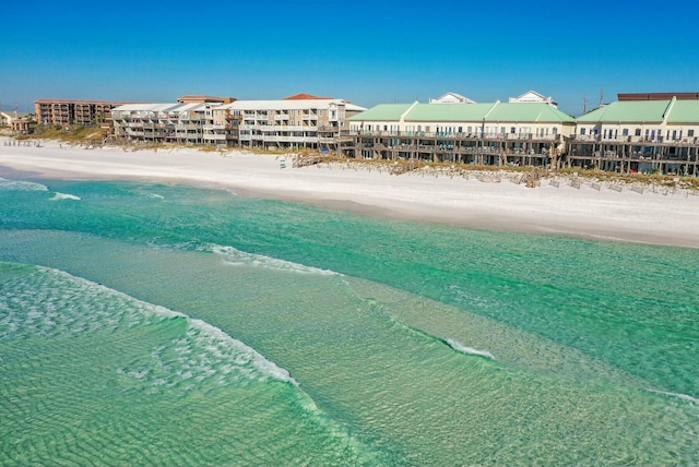 birds eye view of property featuring a beach view