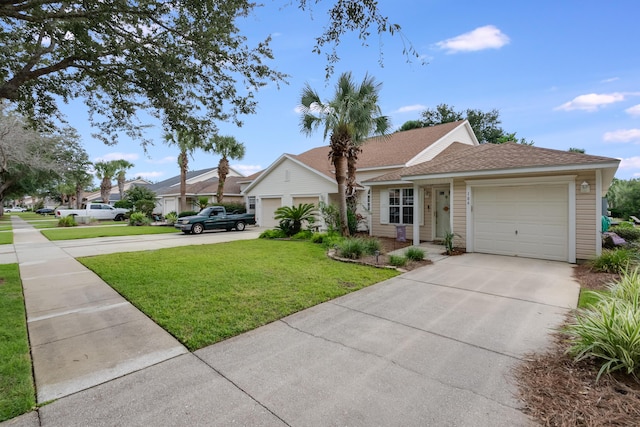 single story home featuring an attached garage, concrete driveway, a front yard, and roof with shingles