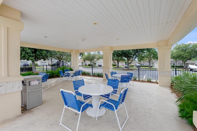 view of patio / terrace featuring outdoor dining area and fence