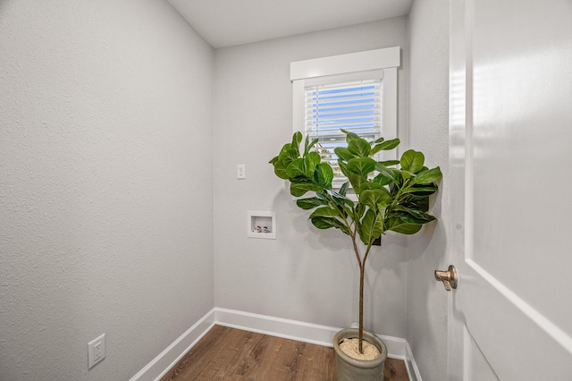 details with baseboards and wood finished floors