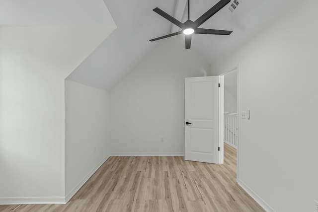 bonus room featuring visible vents, baseboards, light wood-style floors, lofted ceiling, and ceiling fan