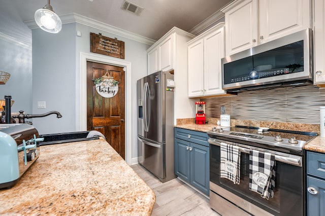 kitchen featuring white cabinetry, blue cabinetry, visible vents, and appliances with stainless steel finishes