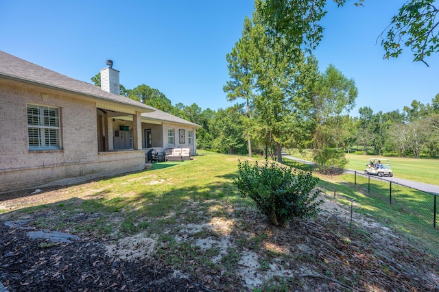 view of yard featuring fence