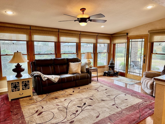 tiled living room featuring recessed lighting, a healthy amount of sunlight, ceiling fan, and vaulted ceiling