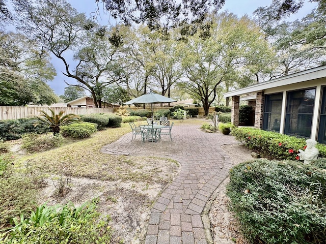 view of yard with a patio area and fence