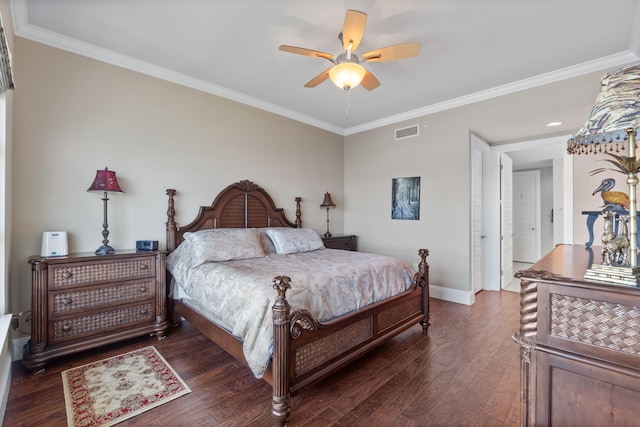 bedroom featuring visible vents, ornamental molding, a ceiling fan, dark wood-style floors, and baseboards