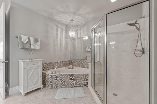 bathroom featuring a shower stall and a garden tub