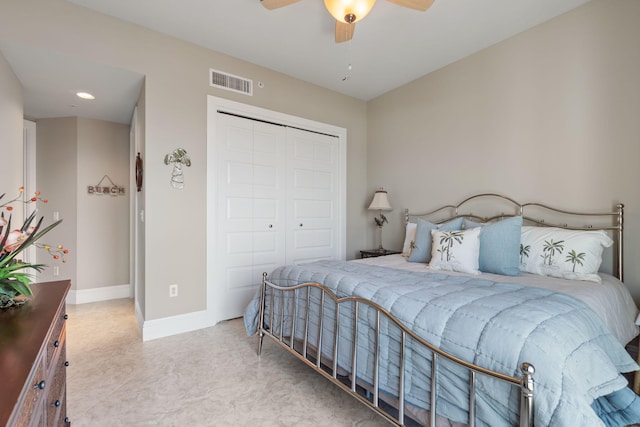 bedroom with visible vents, baseboards, a closet, and a ceiling fan