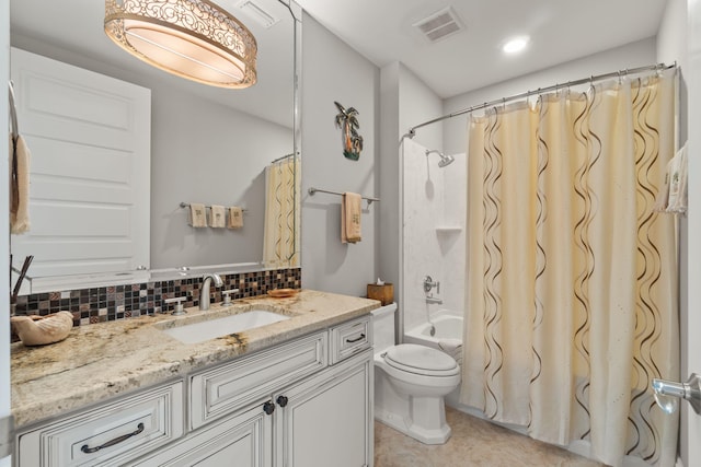 bathroom with visible vents, backsplash, toilet, shower / bath combo with shower curtain, and vanity