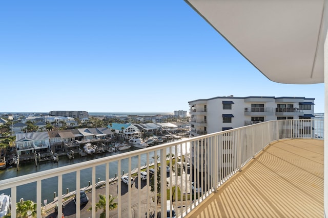 balcony featuring a water view