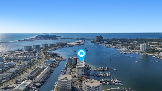 aerial view featuring a view of city and a water view