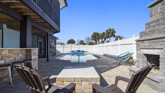 view of patio featuring a fenced in pool and a fenced backyard