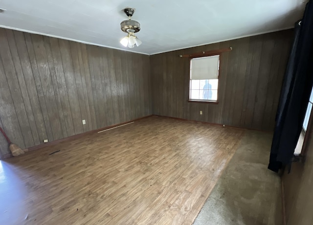 empty room with wood finished floors