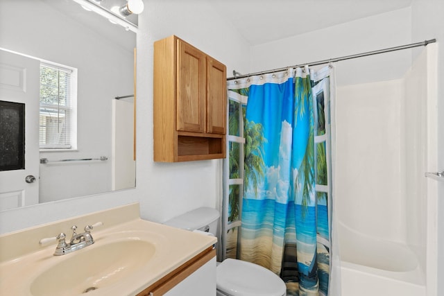 bathroom featuring shower / bathtub combination with curtain, toilet, and vanity