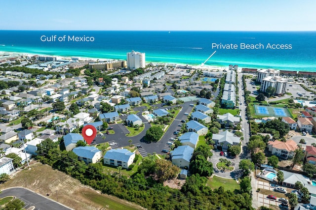 drone / aerial view featuring a residential view and a water view