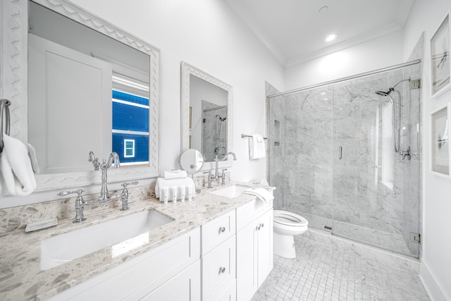 full bath featuring crown molding, toilet, a stall shower, and a sink