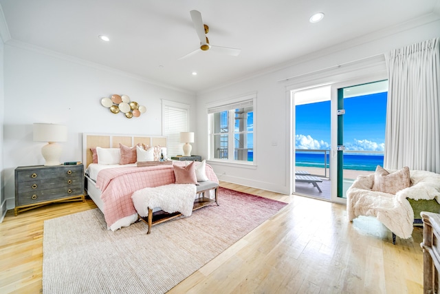 bedroom featuring recessed lighting, light wood-style floors, crown molding, and access to outside