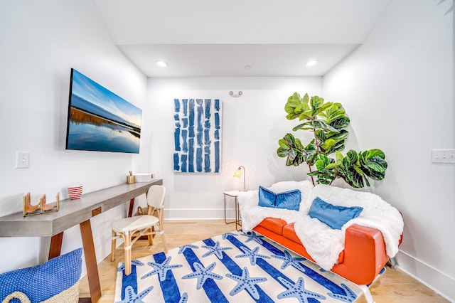 bedroom featuring recessed lighting, wood finished floors, and baseboards