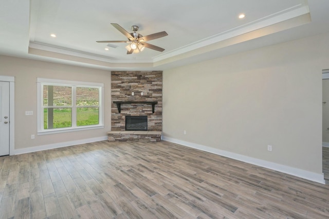 1517 Kais St, Baker, FL 32531 - unfurnished living room with ornamental molding, a ceiling fan, wood finished floors, and a raised ceiling