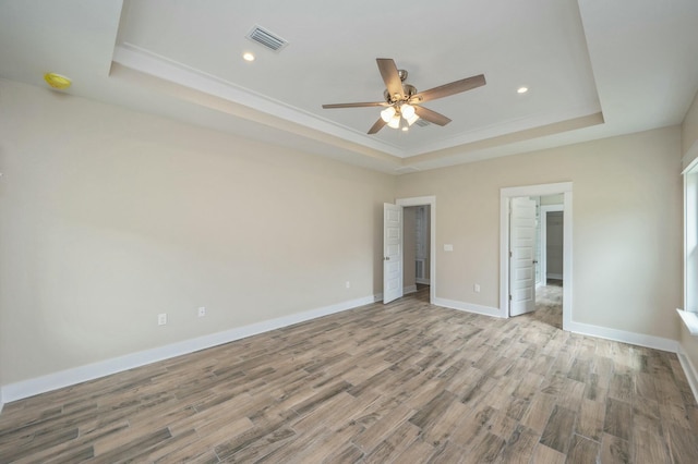 1517 Kais St, Baker, FL 32531 - unfurnished bedroom featuring recessed lighting, a raised ceiling, wood finished floors, visible vents, and baseboards