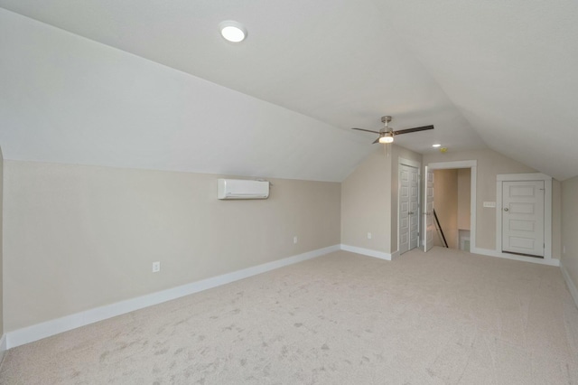 1517 Kais St, Baker, FL 32531 - additional living space with a wall mounted air conditioner, vaulted ceiling, a ceiling fan, baseboards, and carpet flooring
