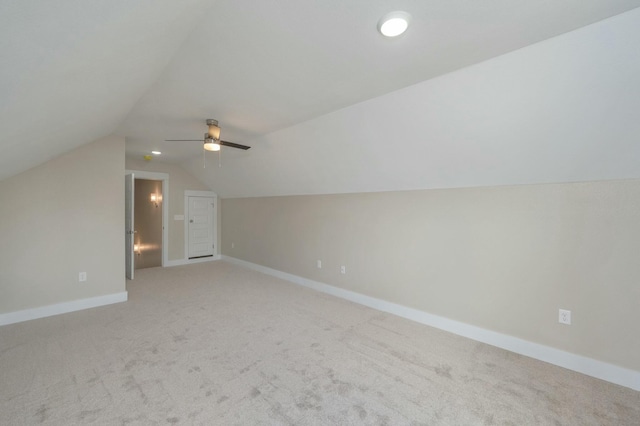 1517 Kais St, Baker, FL 32531 - additional living space with baseboards, lofted ceiling, a ceiling fan, and light colored carpet