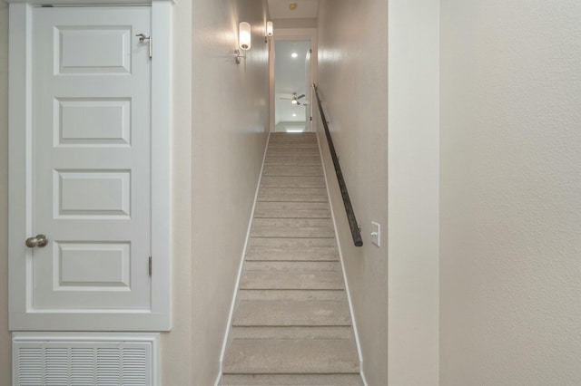 1517 Kais St, Baker, FL 32531 - staircase featuring a textured wall, visible vents, and baseboards